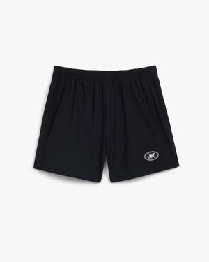 Front view of black swim trunks with a white oval horse patch on the left leg