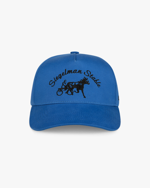 Front view of a cobalt blue 5-panel snapback with black Siegelman Stable script and horse and sulky embroidery