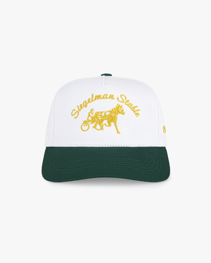 Front view of a white and dark green 5-panel cap with gold Siegelman Stable script and horse and sulky embroidery