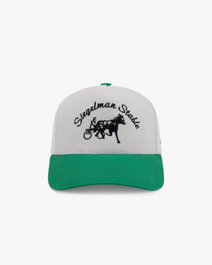 Front view of a gray and green two-tone 5-panel cap with black Siegelman Stable script and horse and sulky embroidery