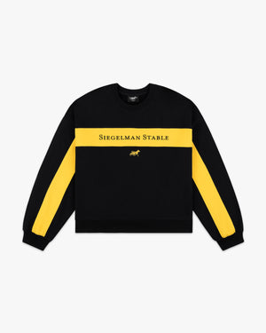 Front view of a black retro crewneck with yellow chest stripe, sleeve stripes, Siegelman Stable text and horse logo