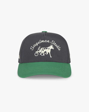 Front view of the Maxfli x Siegelman Stable 5-panel hat, charcoal crown, green visor and cream script and horse logo