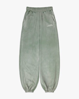 Green sweatpants with a logo on a white background