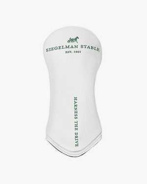 Front view of the Maxfli x Siegelman Stable white leather golf head cover with green logo and Harness the Drive text