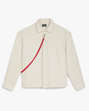 Front view of a vaporous gray harness button up shirt with a red harness strap clipped at the collar