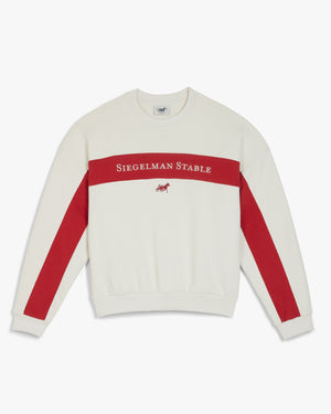 Front view of a vaporous gray retro crewneck with red chest panel and sleeve stripes, Siegelman Stable text and horse