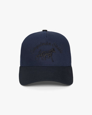 Front view of a navy and black two-tone 5-panel cap with tonal black Siegelman Stable script and horse and sulky embroidery