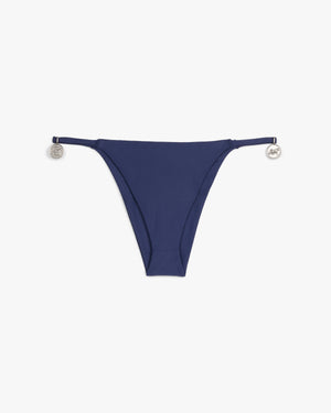 Front view of a navy string bikini bottom with silver horse pendants at the hips