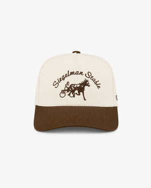 Front view of a dark brown and ivory two-tone 5-panel cap with brown Siegelman Stable script and horse and sulky embroidery