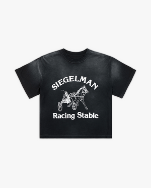 Front view of a black potassium-wash boxy tee with white Siegelman Racing Stable horse and sulky graphic