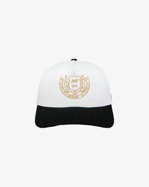 Front view of a white and black Heritage Crest 5-panel pro cap with gold Siegelman Stable crest