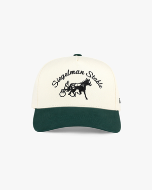 Front of a cream and dark green two-tone 5-panel cap with matte black Siegelman Stable script and horse and sulky logo