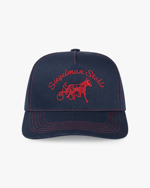 Front view of the St. John's Red Storm x Siegelman Stable navy hat with red Siegelman Stable script and horse and sulky logo