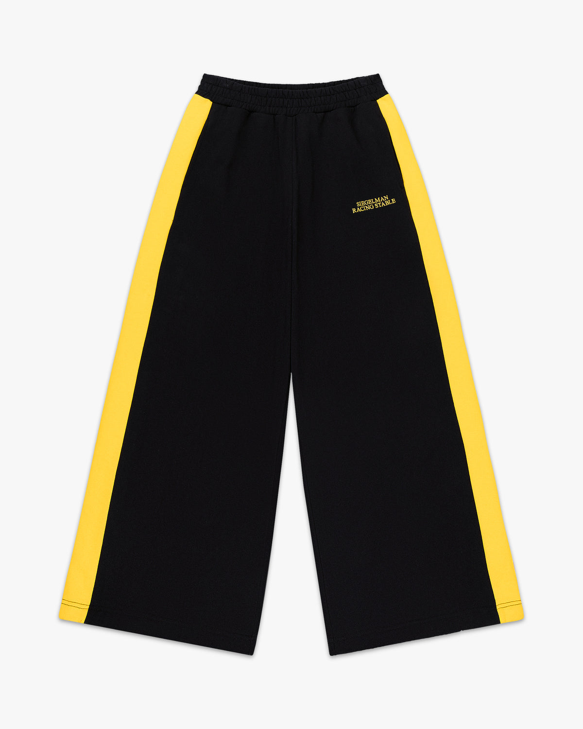 Front view of black wide leg retro sweatpants with yellow side stripes and small yellow hip text