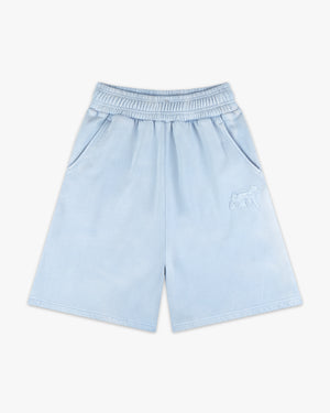 Front view of celestial blue emblem oversized sweatshorts with elastic waist