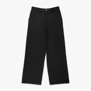 Front view of black wide leg coaches pants with a small woven logo patch