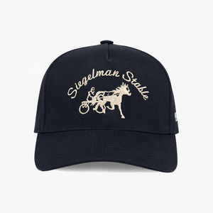 Front view of a navy 5-panel pro cap with cream Siegelman Stable script and horse and sulky embroidery